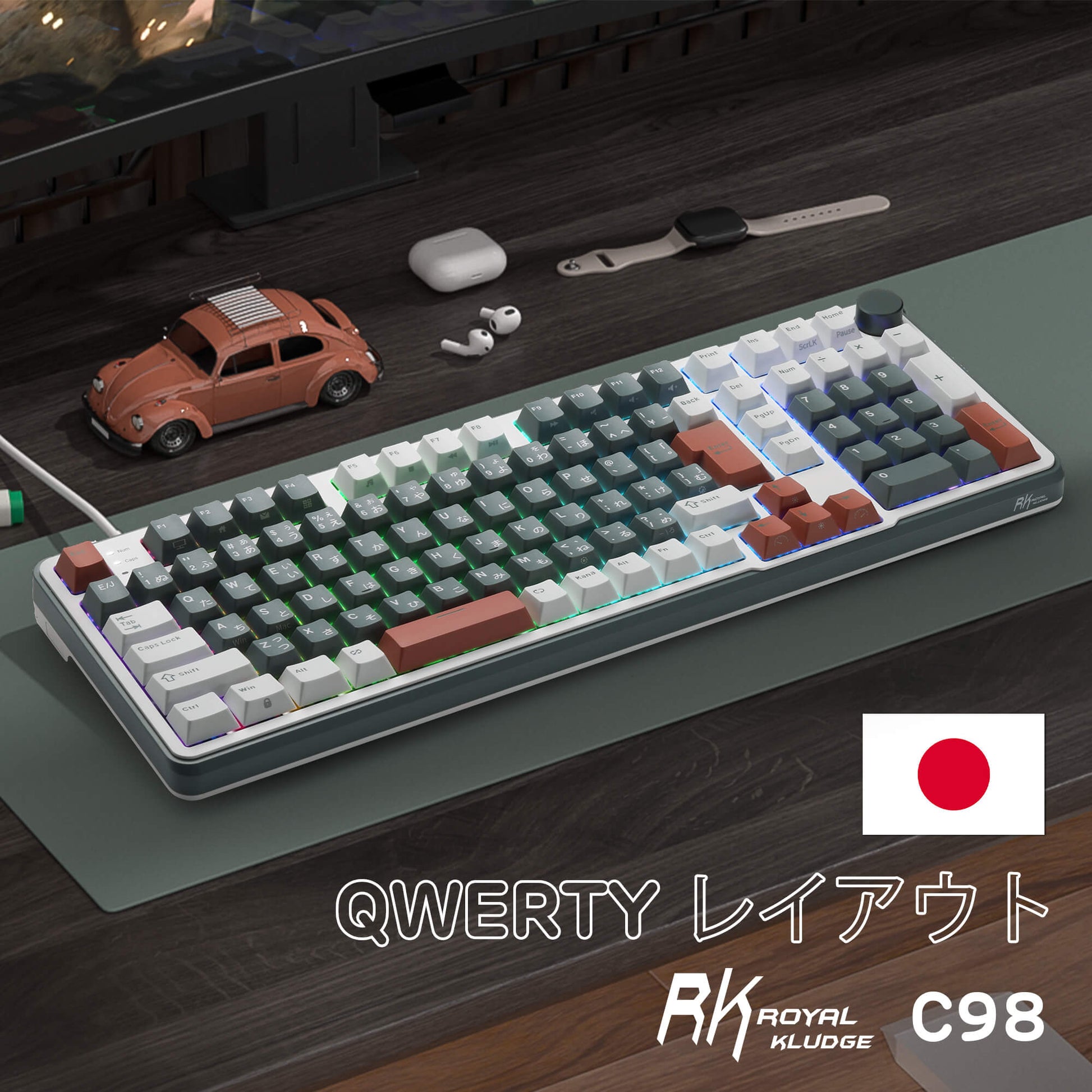 RK C98 Mechanical keyboard with a wrist rest, car model, and earbuds on a desk, featuring the RK Royal Kludge logo.