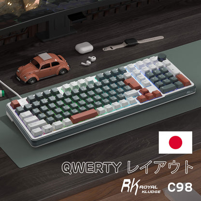 RK C98 Mechanical keyboard with a wrist rest, car model, and earbuds on a desk, featuring the RK Royal Kludge logo.