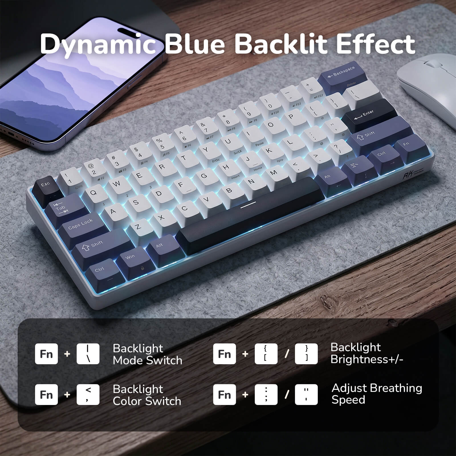 Mechanical keyboard with dynamic blue backlit effect on a desk with smartphone and mouse.