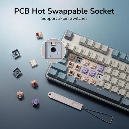 Keyboard with hot swappable switches and tools on a blue background