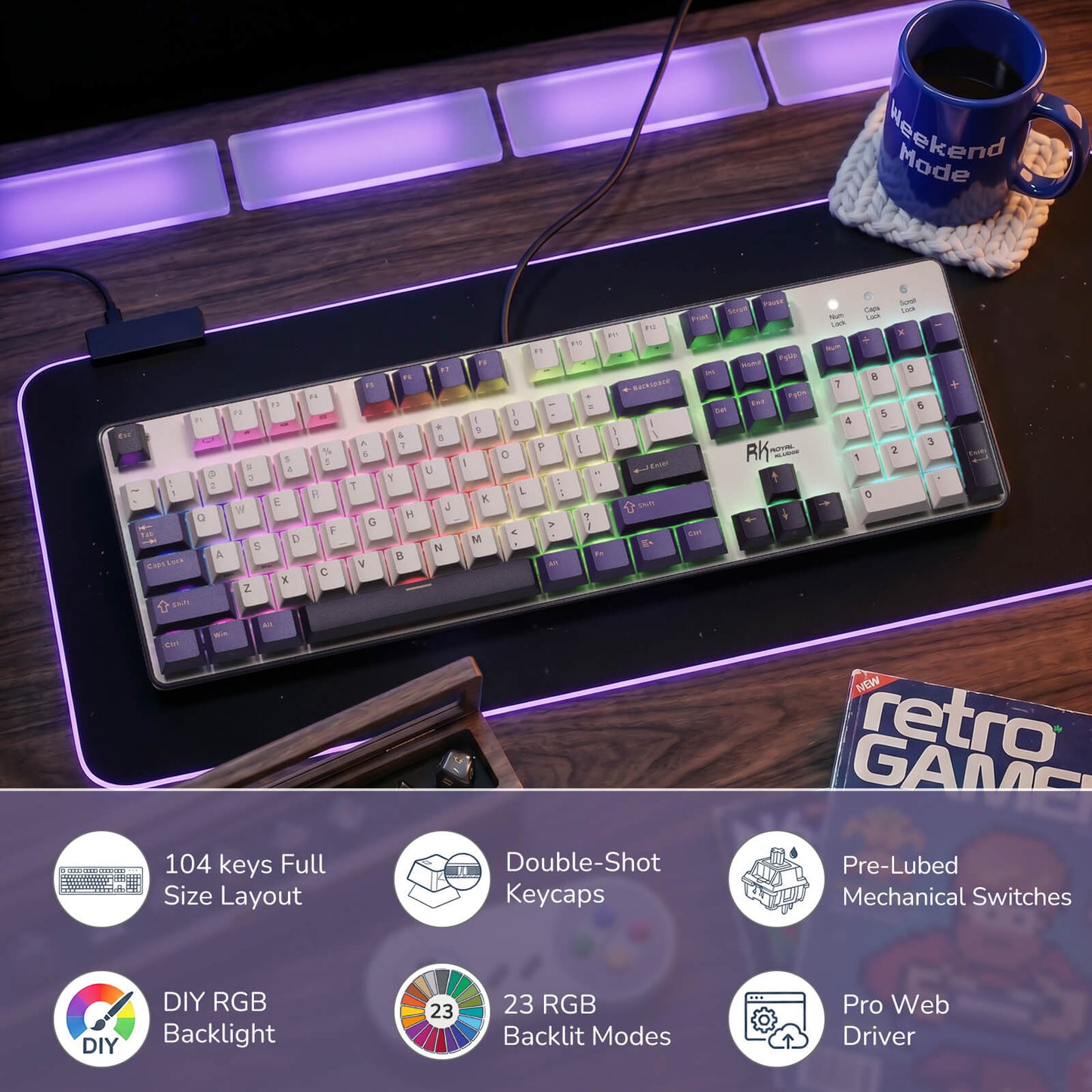 Mechanical keyboard with RGB backlighting on a desk, featuring a mug and retro gaming magazine.